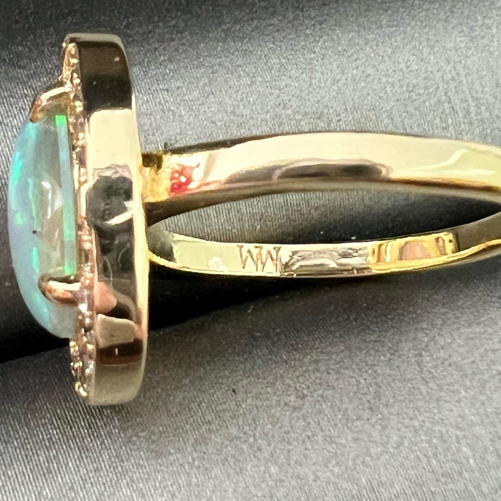 Elegant Gold Opal Ring with Diamond Accents - Picture 13 of 14